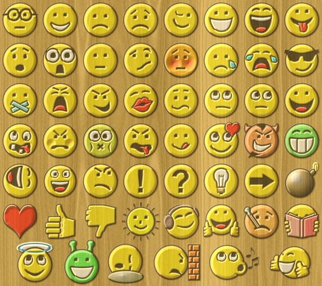 A generated wood-texture background shows 56 different emojis. Some show happy expressions, sad expressions, angry, crying, laughing and more. There are also non-expressive emojis, such as a thumbs-up image, thumbs down, a red heart, a green alien and more.